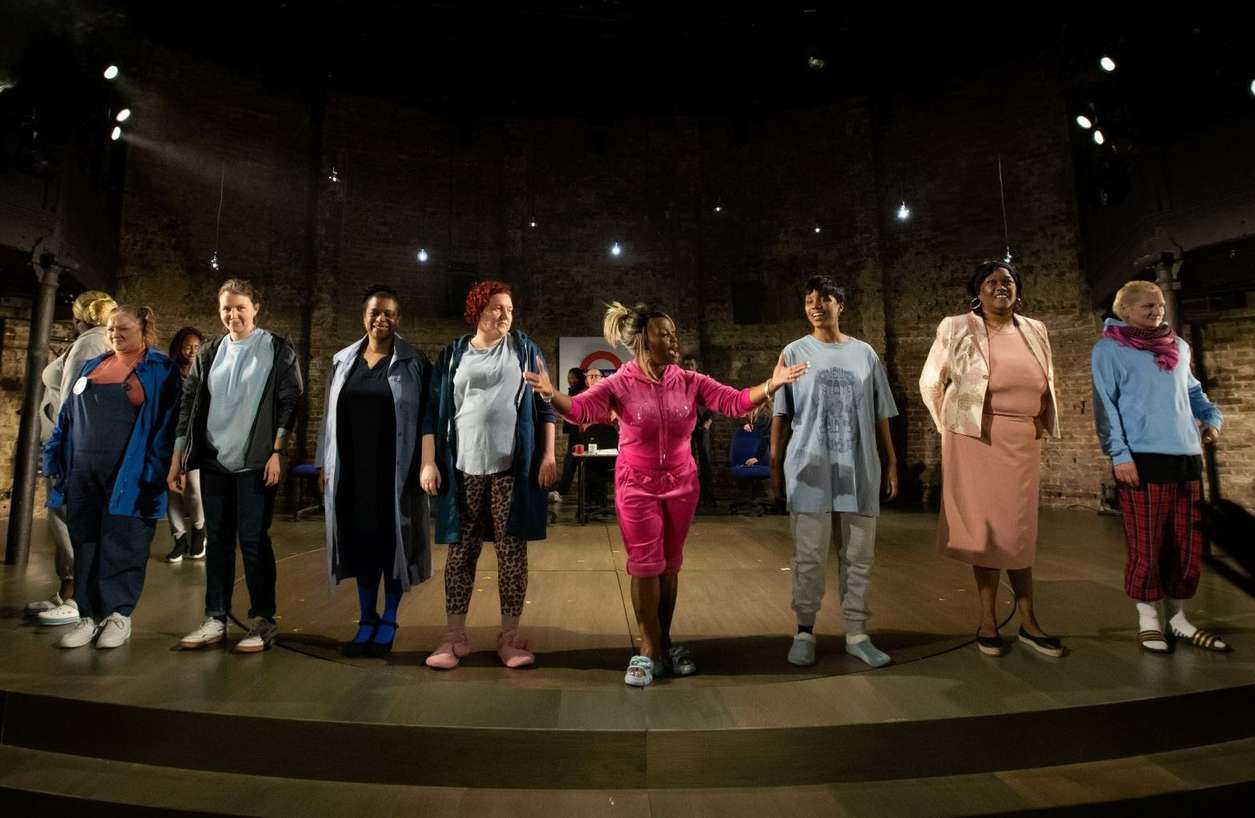 a production photo from more than we can bear at the Almeida theatre, the cast are taking their bows on stage