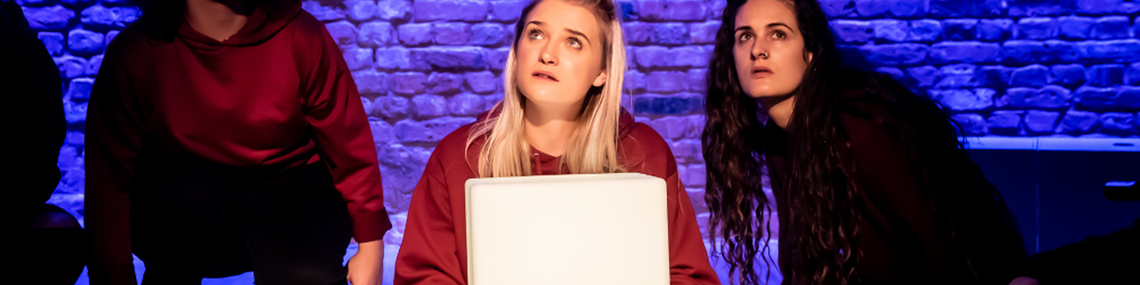 three young artists performing in Inside This Box