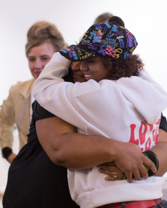 clean break members hugging