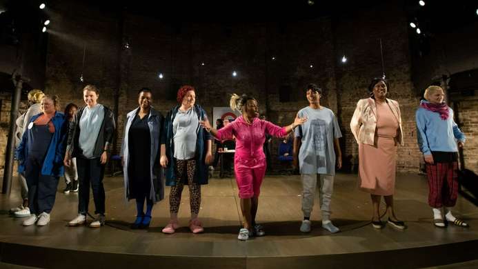 a production photo from more than we can bear at the Almeida theatre, the cast are taking their bows on stage