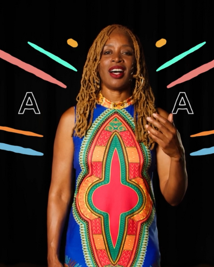 JB Rose singing to camera, illustrations of colourful lines and the word 'Aaah' are around her