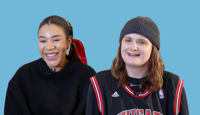 Ro and Shona smiling with a blue background